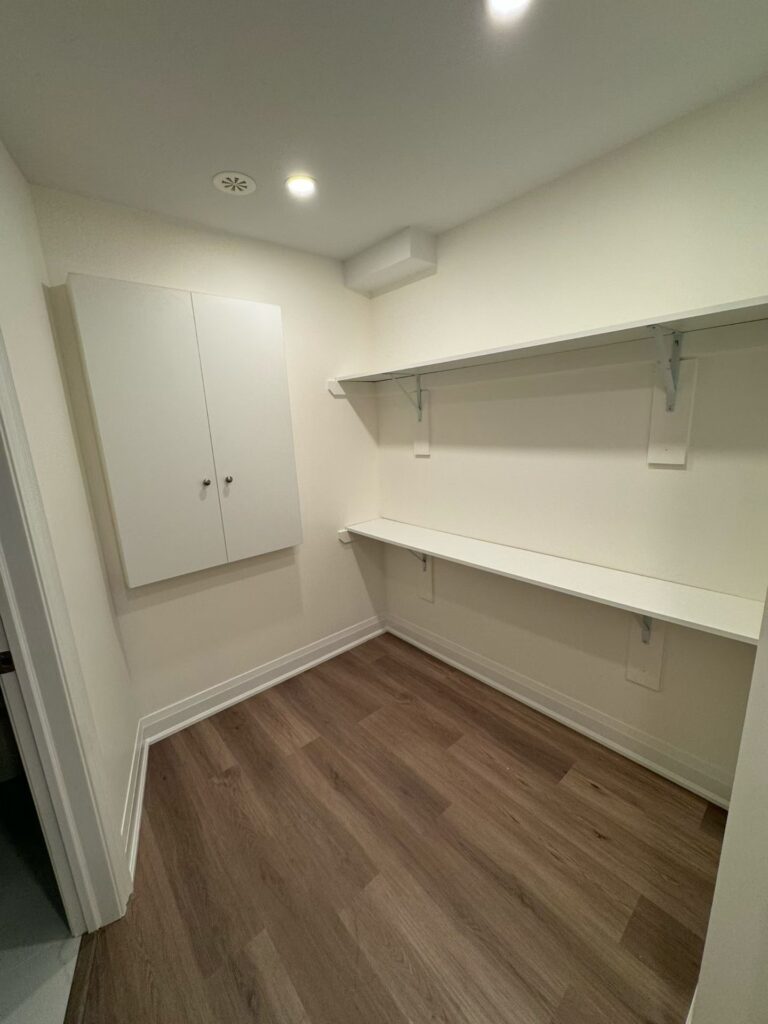 North York Basement Renovation: From Unfinished Storage to a Functional Living Space 8 finished basement storage area in North York home