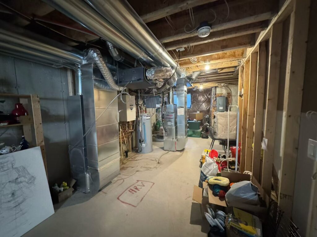 North York Basement Renovation: From Unfinished Storage to a Functional Living Space 4 HVAC and ductwork during North York basement renovation