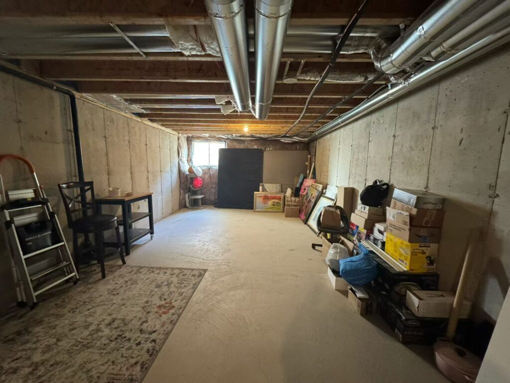 North York Basement Renovation: From Unfinished Storage to a Functional Living Space 3 unfinished basement before renovation in North York